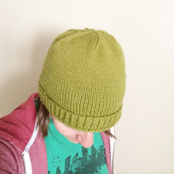 green hat front top
